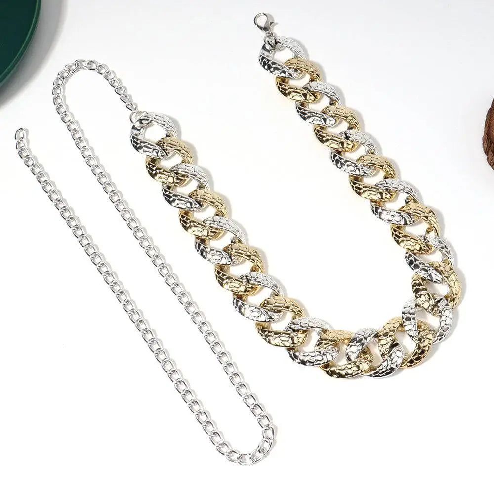 Two tone chain body jewelry belt in gold and silver with textured interlocking links for summer body jewelry use