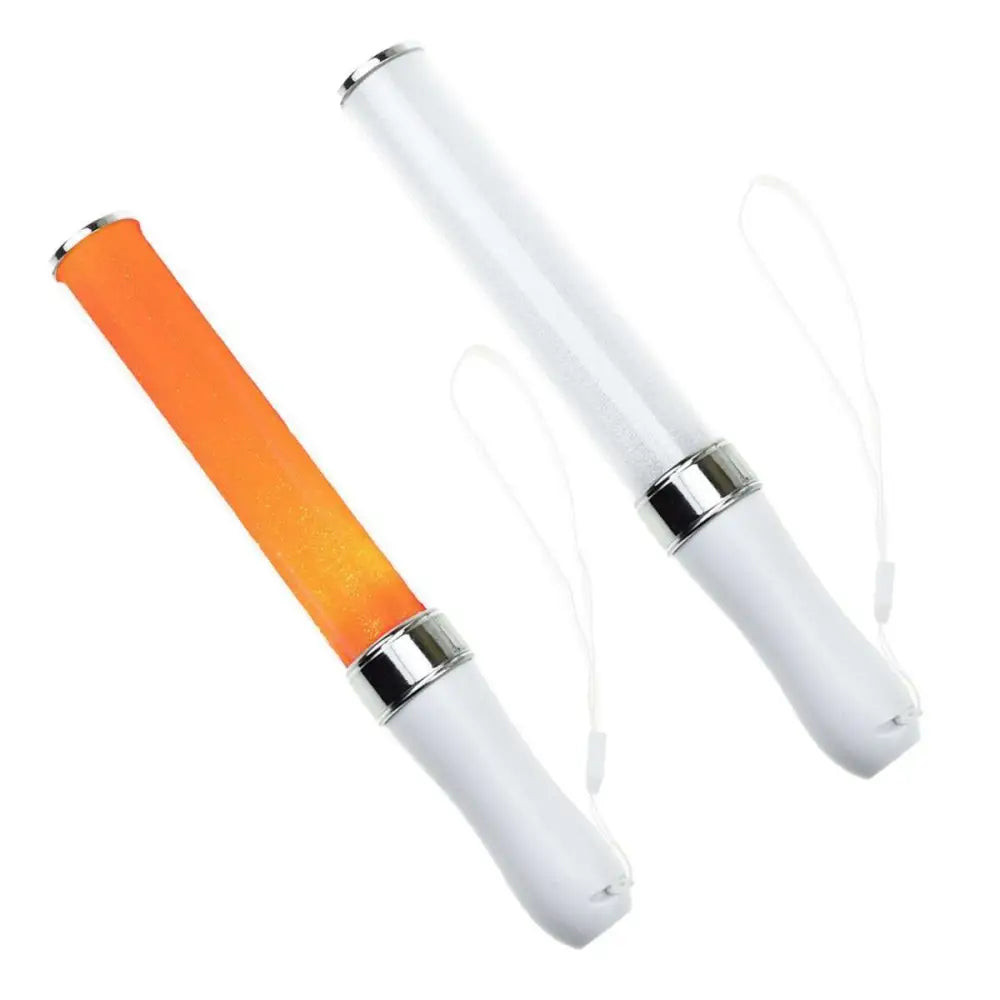 Two white LED glow stick lights with clear bodies, silver accents, and wrist straps for easy handling