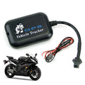 Black tx-5 car motor gps locator tracker with motorcycle graphic connected to wiring for motor vehicle tracking