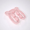 Pink plastic u shape trigger point massage roller with four textured wheels for muscle relief and point massage
