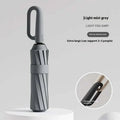 Ultra thin black bone ring buckle umbrella with light mist grey foldable canopy and sturdy handle design
