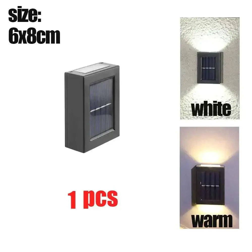 Black rectangular up and down solar powered garden lights with sleek modern design and white or warm color options using solar power technology
