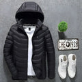 Black quilted usb electric heated jacket coat with hood white inner lining subtle chest logo and glowing orange accents