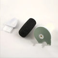 Black textured usb rechargeable electric callus remover with foam nail file, sponge pad, and brush for foot care