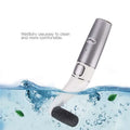 Silver and white usb rechargeable electric callus remover with a black textured sponge tip for dead skin care