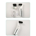 Silver and white usb rechargeable electric callus remover with black textured sponge attachments for dead skin removal