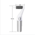 Usb rechargeable electric callus remover with white and silver body and a black textured head for dead skin removal