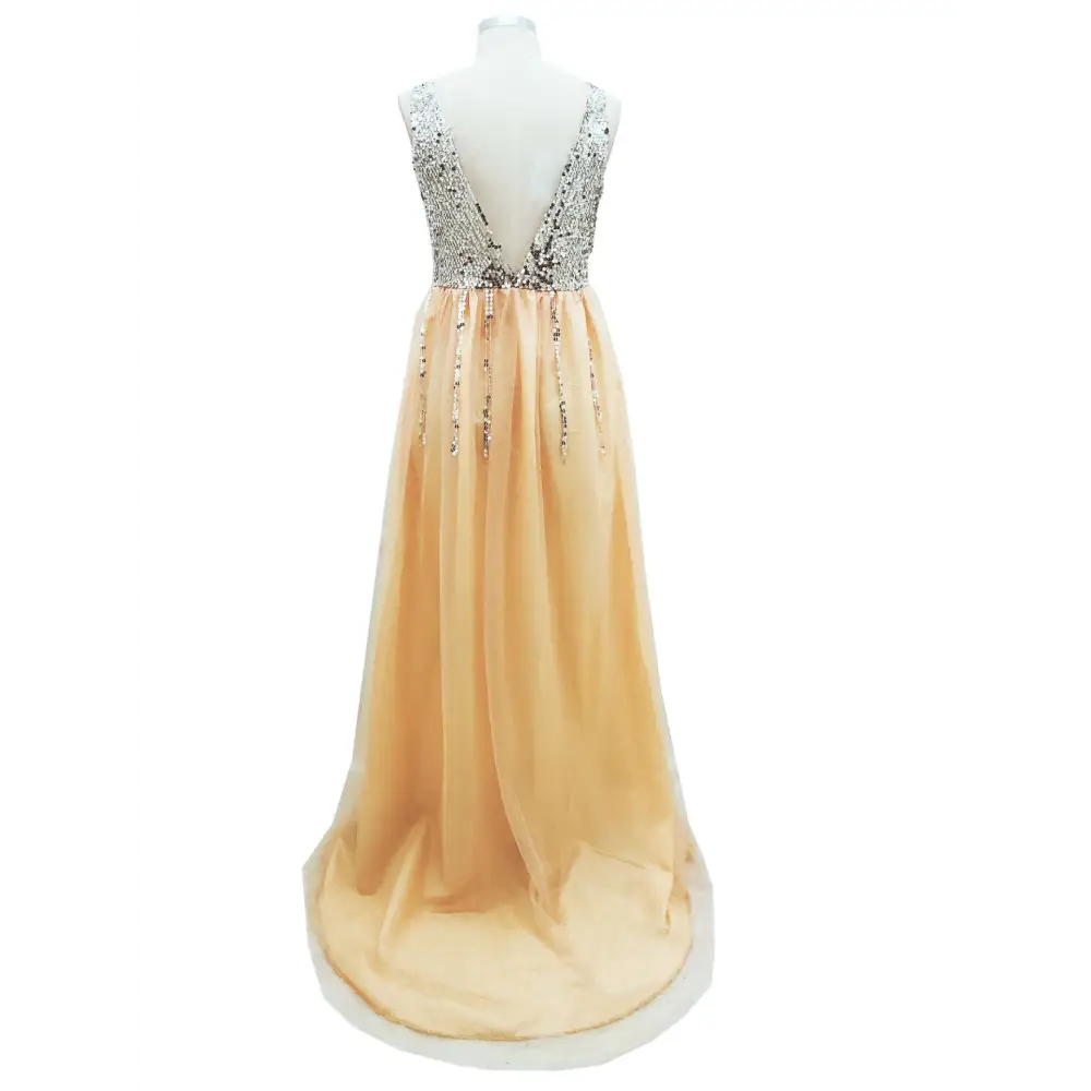 A shimmering gold v-neck sequined floor-length dress with intricate beaded bodice and flowing layered tulle skirt