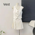 White v-neck vest with three gold buttons paired with high waist pleated apricot waistcoat skirt two-piece set