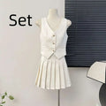 White v-neck vest and high waist pleated skirt two-piece set featuring apricot waistcoat in a sleeveless design