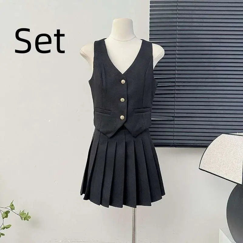 Black high waist pleated skirt and v-neck vest two-piece set with gold buttons in apricot waistcoat style