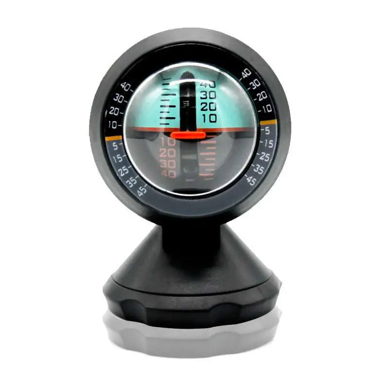 Black circular vehicle mounted sensing slope meter gauge with orange indicator and precise angle measurement dial