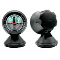 Black plastic vehicle mounted sensing slope meter with circular dial and orange pointer for accurate slope measurement