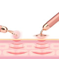Rose gold vibra beauty vibrating gemstone roller with spherical and flat ends for skincare massage and beauty use
