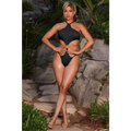 Black one-piece swimsuit with vibrant blue cutout design and circular metal accent at the waist with halter neckline