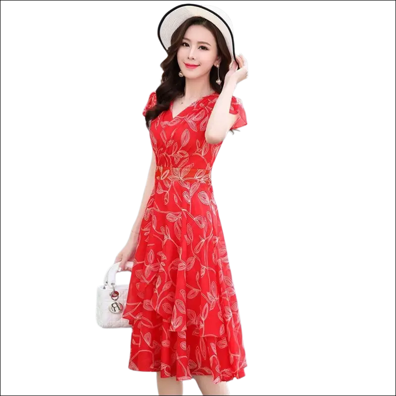 A vibrant red chiffon dress featuring white leaf embroidery and a ruffled hem in this chiffon dress image