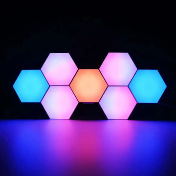 Vibrant smart hexagon lights with dynamic lighting in blue pink and orange forming a glowing geometric pattern