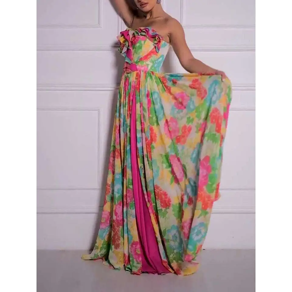 A vibrant strapless floral print maxi dress with pink green yellow and blue ruffled bodice detailing