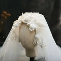 Elegant ivory white bridal veil featuring vintage beaded lace petal headdress with embroidered roses and sparkling beading