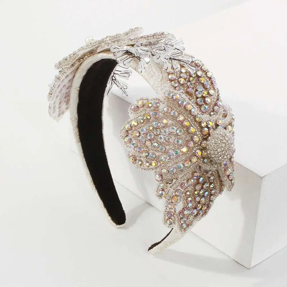 A sparkling silver vintage butterfly headband with iridescent rhinestones and lace vintage crystal floral temperament hair accessories