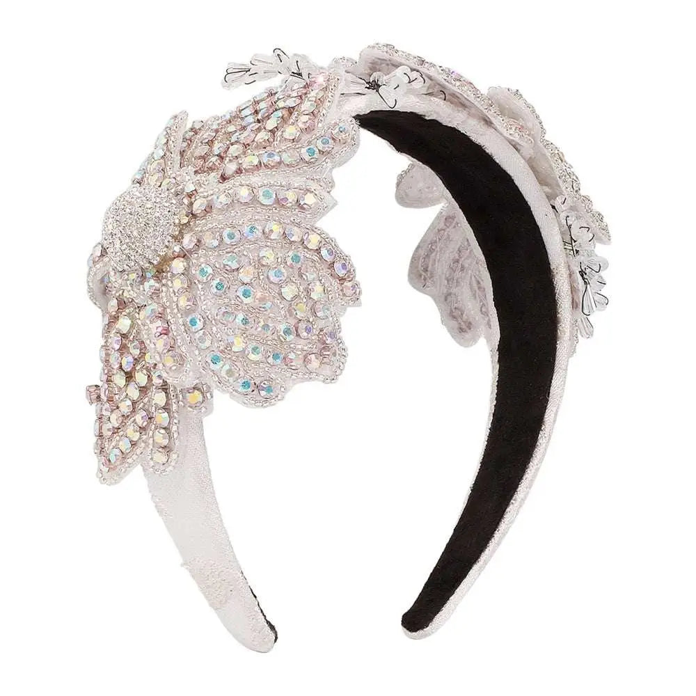 A sparkling silver vintage crystal floral temperament hair accessory headband with iridescent rhinestones and lace detailing
