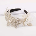 Elegant vintage crystal floral temperament hair accessories featuring a sparkling silver beaded headband with pearls and leaf motifs