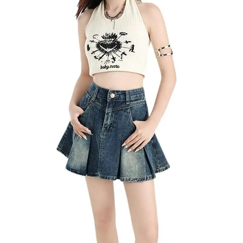 Blue denim pleated mini skirt with high waist and front pockets paired with vintage denim skirt cream halter set