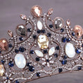 Ornate vintage elegant rose gold bridal crown tiara with sapphire diamond crystals in a floral design