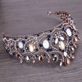 Ornate vintage elegant rose gold bridal crown tiara with sapphires opals amber stones and clear crystals for weddings