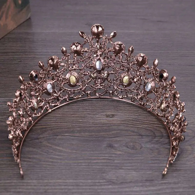 Rose gold ornate vintage elegant diamond bridal crown tiara with intricate filigree and clear and yellow gemstones