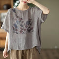 Gray linen vintage ink print floral t-shirt featuring a watercolor floral print in blue red and black shades