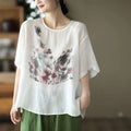 White linen vintage ink print floral t-shirt with loose fit and pink purple gray watercolor floral design