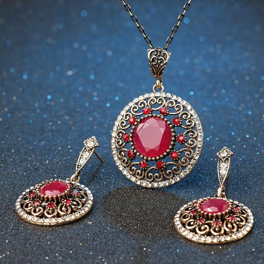 Elegant vintage style genuine luo yang jewelry set with red gemstone pendant necklace and gold-toned filigree earrings