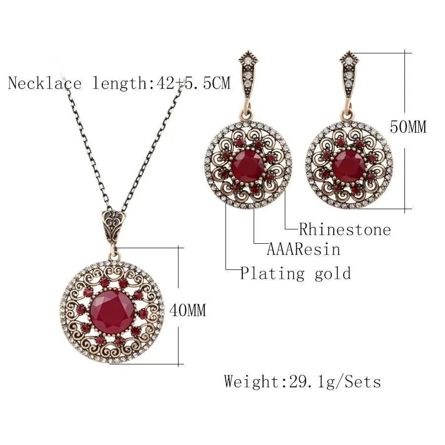 Elegant gold-plated vintage style genuine luo yang jewelry set with filigree design and red aaa resin stones surrounded by rhinestones