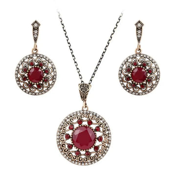 Elegant vintage style genuine Luo Yang jewelry set with red gemstone pendant and gold-toned filigree earrings