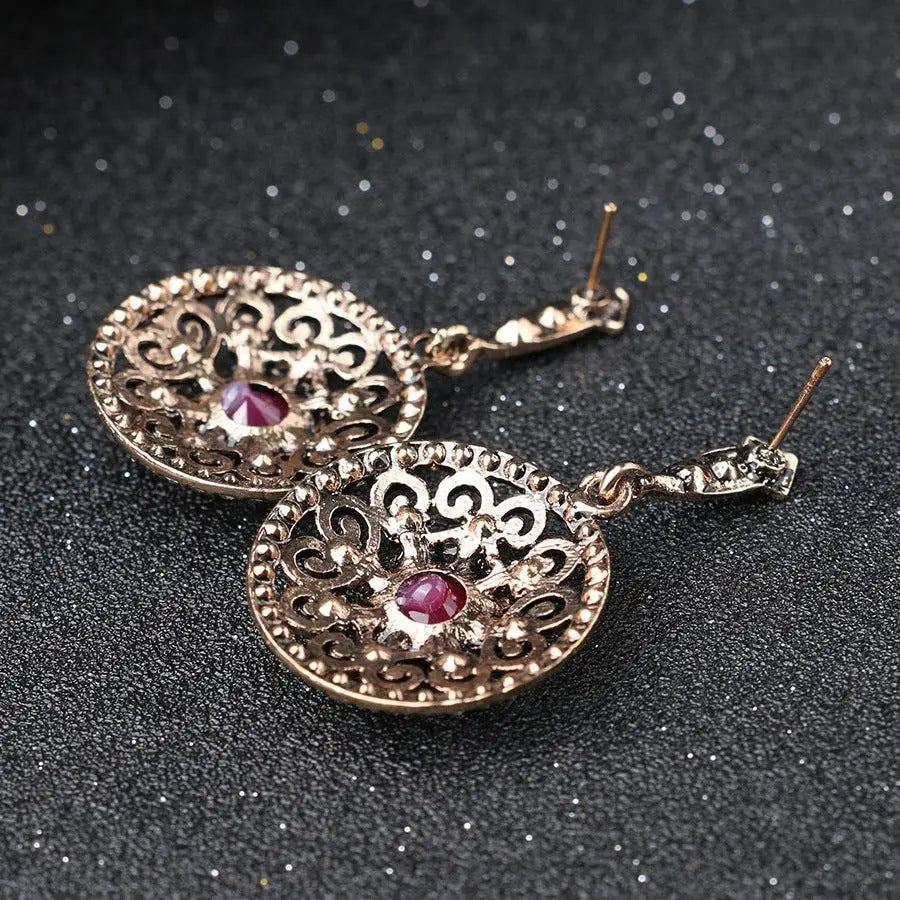 Delicate gold-toned filigree earrings with ruby-red gemstone in vintage style genuine luo yang jewelry set