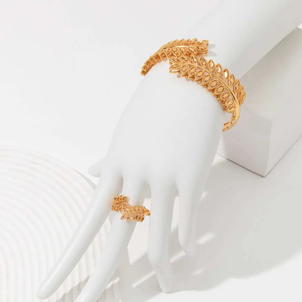 Vintage wheat ear leaf gold bracelet and matching ring set featuring intricate gold leaf patterns