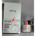 Rtopr vitamin c brightening face cream in a clear glass jar with silver lid and lemon illustrated white box by royale essence lux