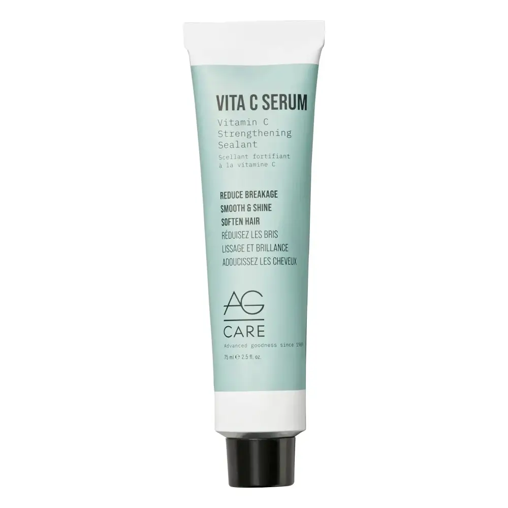 A sleek light teal tube of vitamin c serum strengthening sealant with white cap and black base for damaged hair care