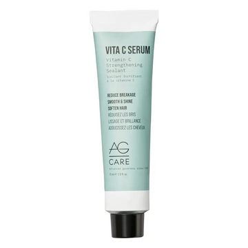 A sleek light teal tube of vitamin c serum strengthening sealant with white cap for damaged hair 2.5 oz