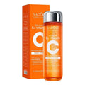 Orange glass bottle with silver cap containing translucent vitamin c whitening toner in orange rectangular box