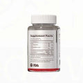 Clear plastic bottle with white ribbed cap containing red vitamin d3 k2 supplementing granules soft candy gummies and supplement facts label on back