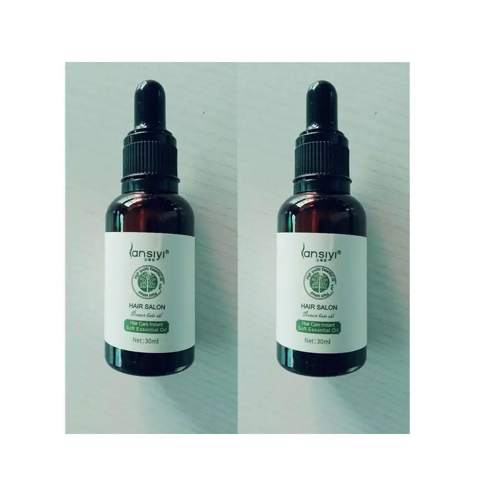 Two identical vitamin e rich hair care essential oil bottles with dark amber glass and black dropper caps by lansiyi