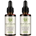 Two amber glass bottles of vitamin e rich hair care essential oil with black dropper cap for salon hair protection