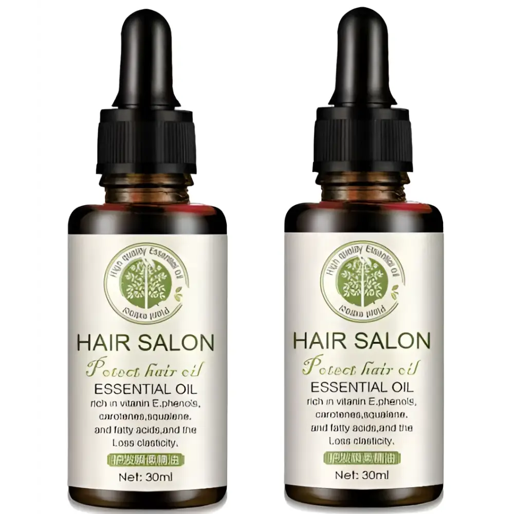 Two amber glass bottles of vitamin e rich hair care essential oil with black dropper cap for salon hair protection