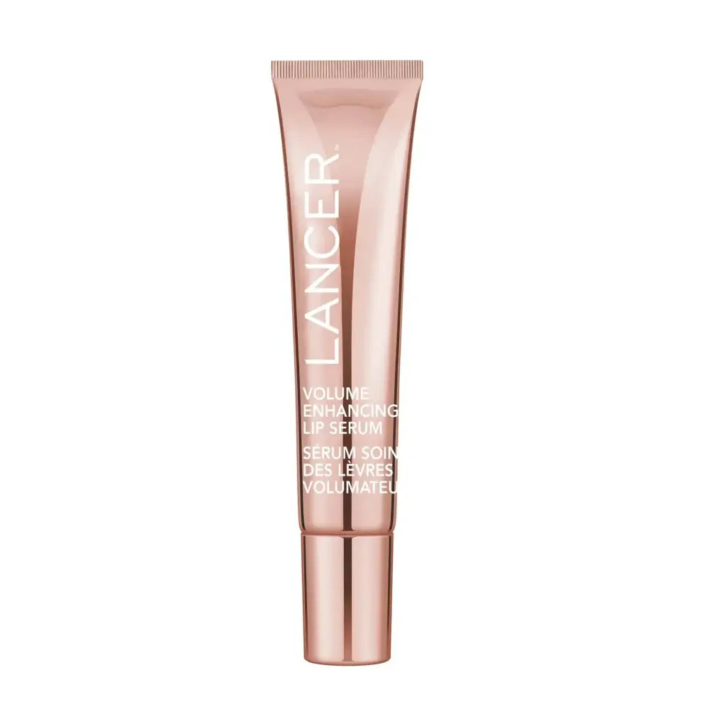 A sleek rose gold tube of lancer volume-enhancing lip serum with hyaluronic acid and minimalist white lettering