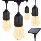 Black outdoor warm edison solar string lights with glowing bulbs and solar panel for led landscape garden lighting