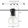 Black plastic fixture holding a clear glass globe bulb with visible filament in warm waterproof string lights