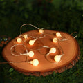 Warm yellow sunshine pearl lights led pearls with warm white frosted glass bulbs and thin metallic wire string lights