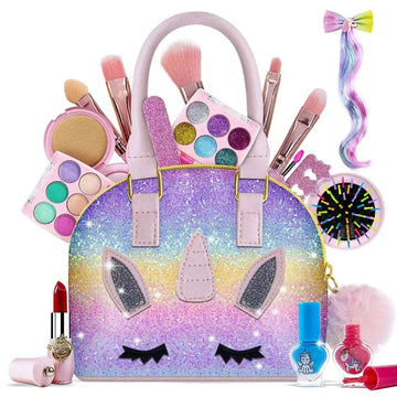 Washable unicorn kids makeup kit with glitter bag features a rainbow gradient finish and pink handles with black eyes